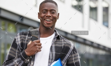 demo-attachment-1115-portrait-of-male-student-standing-outside-college-P9XQ4UM